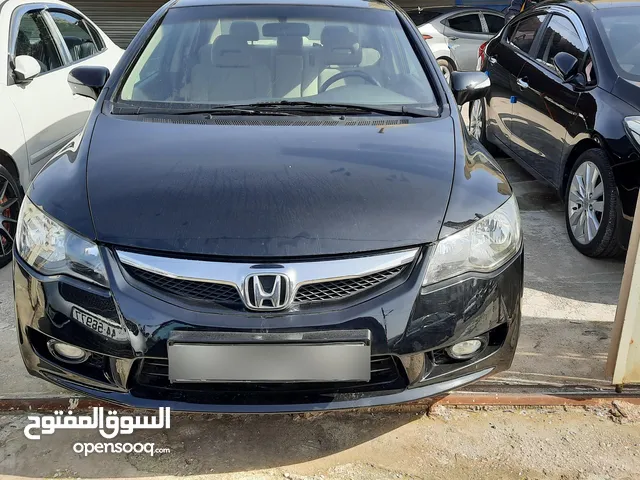 هوندا سيفيك هايبرد موديل 2009 فحص 4 جيد بحاله ممتازه.
