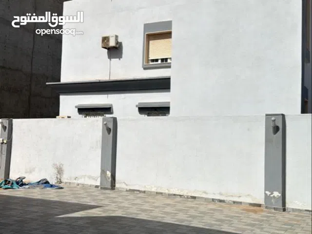 عقار استثماري للبيع  طريق المطار علي الرئيسي