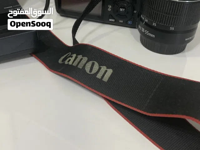 Canon EOS DSLR 1100 with 18-55mm Kit Lens, strap and charger Shutter Counter): 11,355)