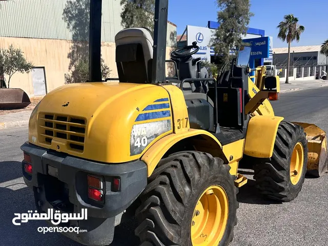 جرافة كوماتسو 40-6 و TCM تب نظافة على الفحص الكامل