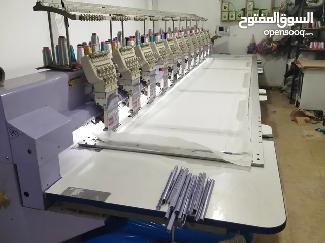 الماكينه تطريز 12 راس حاله جيده جدا يشبه الجديد ضمان شهر صيانه بعد البيع