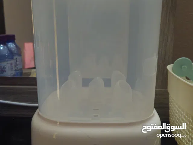 Electric steam bottle steriliser معقم رضاعات اطفال بالبخار