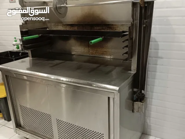 Coffee grinder and shawarma stands