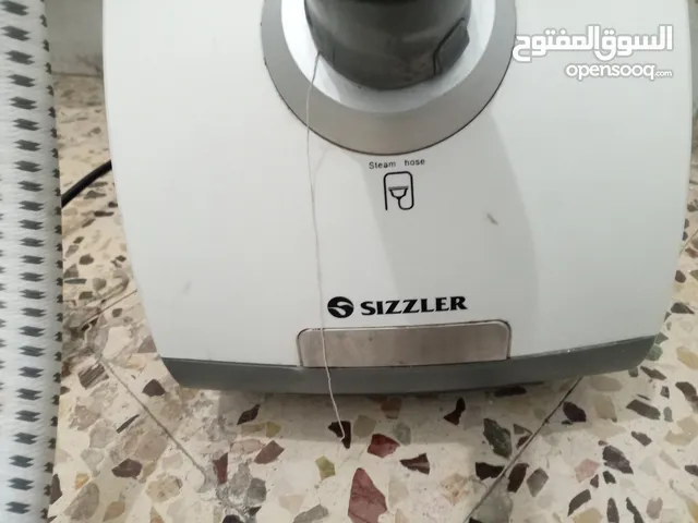 مكواه SlZZLER