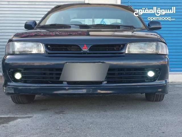 متسوبيشي لانسر موديل 1994 لون كحلي ترخيص طويل