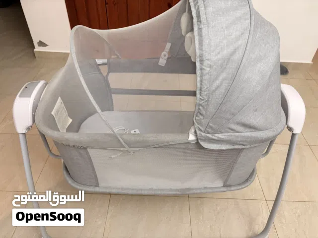 سرير أطفال كهربائي