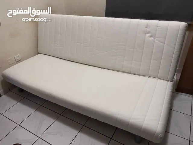 Sofa bed with mattress and cover