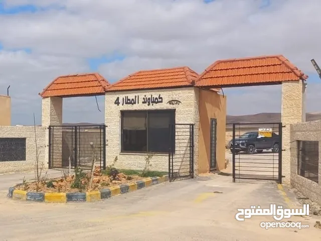 أرض بمساحة 3600m على طريق المطار ضمن كومباوند المطار 4
