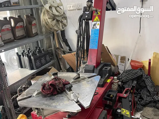 Air compressor and tire removal racks for sale بيع رفوف وكمبريسر وجهاز فك الاطارات