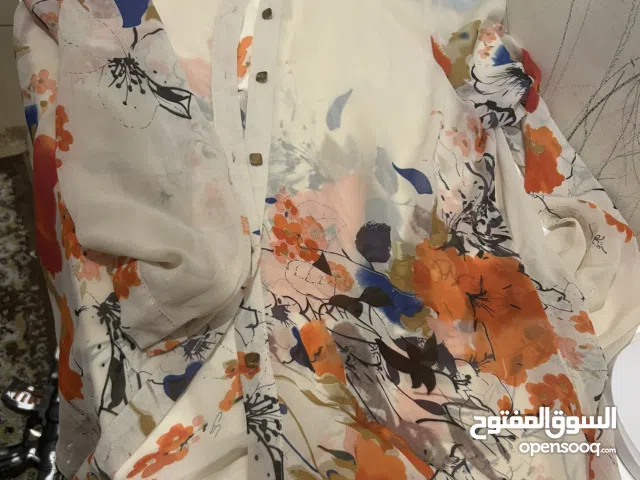 بلوزات طويلة مقاس L باكمام