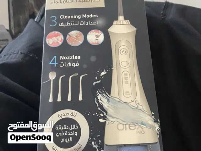 جهاز تنظيف الاسنان بالماء