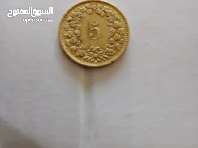 une petite piece monnaie suisse