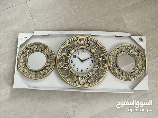 Brand new wall clock and mirrors