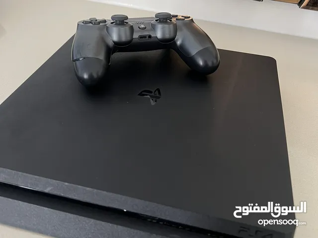 PS4 Slim with a controller