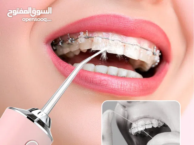 جهاز تنظيف الاسنان المائي