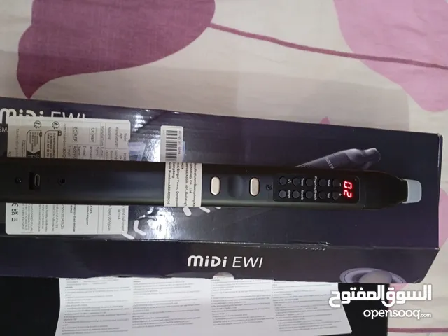 الة عزف موسيقي نفخ إلكترونية ساكسفون