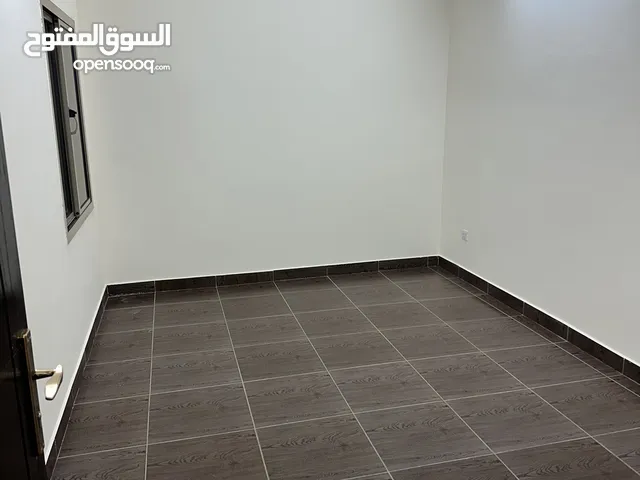 A two-bedroom apartment with a living room for rent, suitable for bachelors. With ewa west riffa