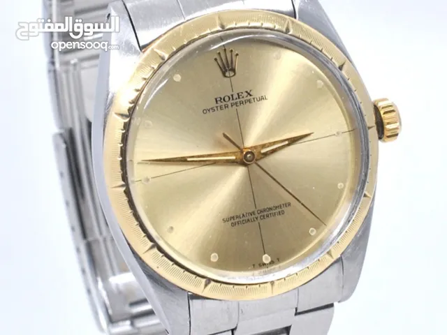 ORIGINAL ROLEX OYSTER PERPETUAL  A stainless steel and gold automatic bracelet watch