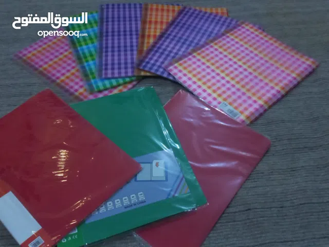 10 ملفات مدرسية وقرطاسية – ألوان متنوعة