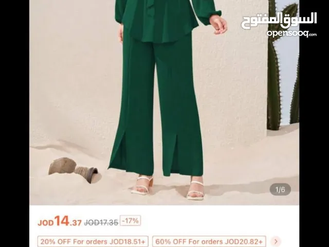 طقم من شي ان لون اخضر مش ملبوس ولا مره