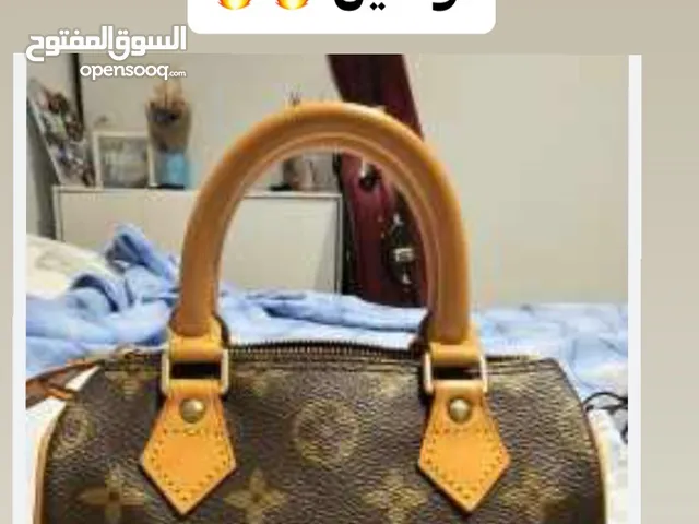 brown Louis Vuitton for sale  in Jerash