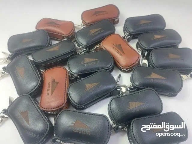 ميدالية مفاتيح جلد طبيعي فاخر مع طباعة شعارك – هدية مثالية للعملاء والشركات