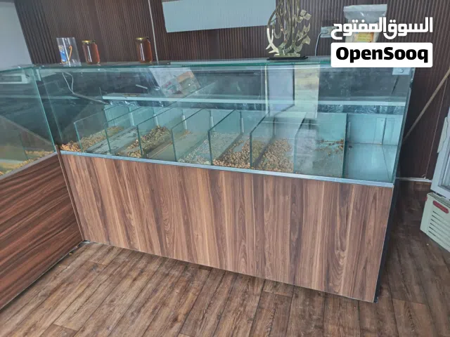مكينات تسخين مكسرات وتلاجة عرض