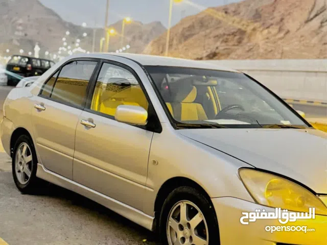 Used 2006 Mitsubishi Lancer GLX Plus Sedan Electric Silver with LED Lights and Android Auto