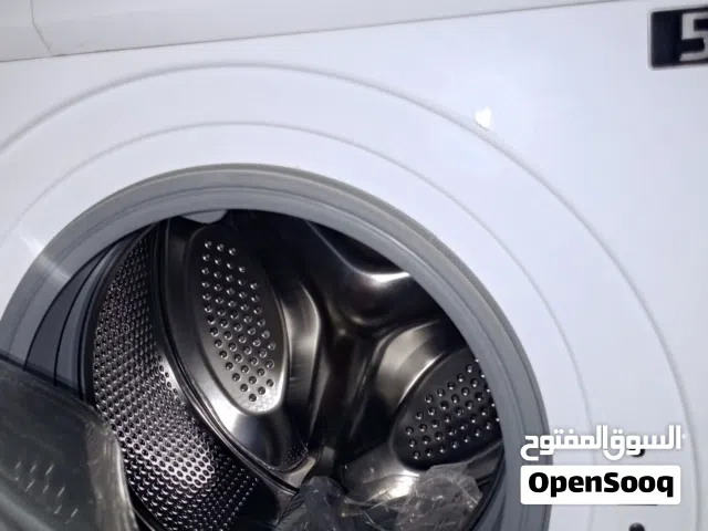 غسالة ملابس اوتوماتيك