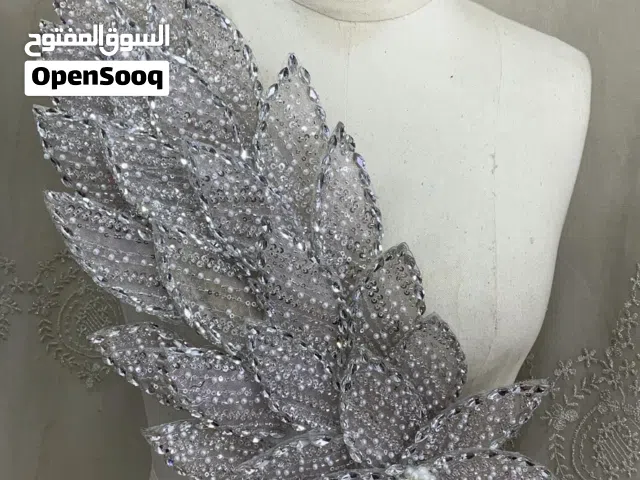تصميم فساتين وعبايات