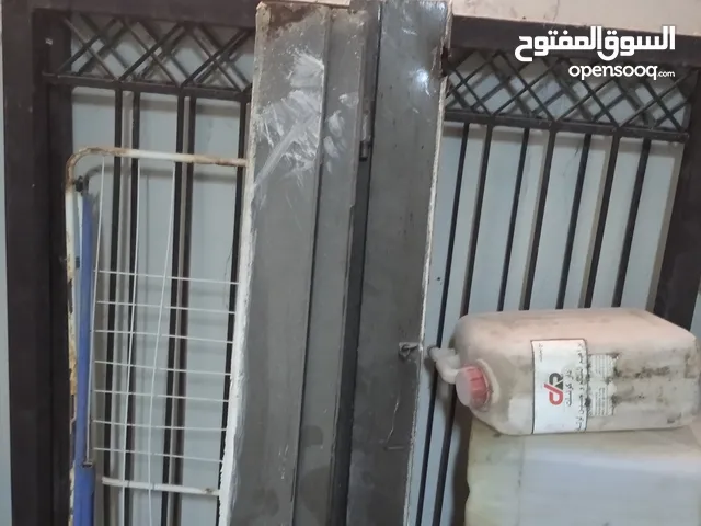 باب جراج دلفتين حديد بحالة ممتازة عرض156طول154+باب مدخل بيت خارجي دلفتين حديد بحالة ممتازة عرض69طول