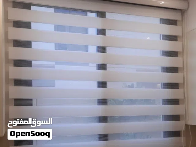 الستائر الزيبرا