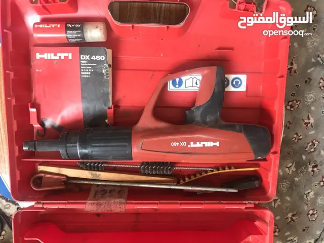 مسدس مسامير وميزان ليزر