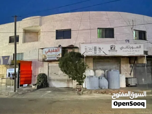مجمع استثماري للبيع في موقع متميز - 5 محلات و3 شقق – إربد / دوار المريسي – من المالك مباشرة