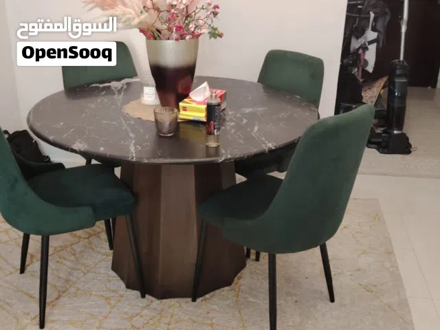 Round Marble-Top Dining Table with 4 Green Velvet Chairs