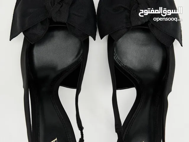 Black With Heels in Tripoli