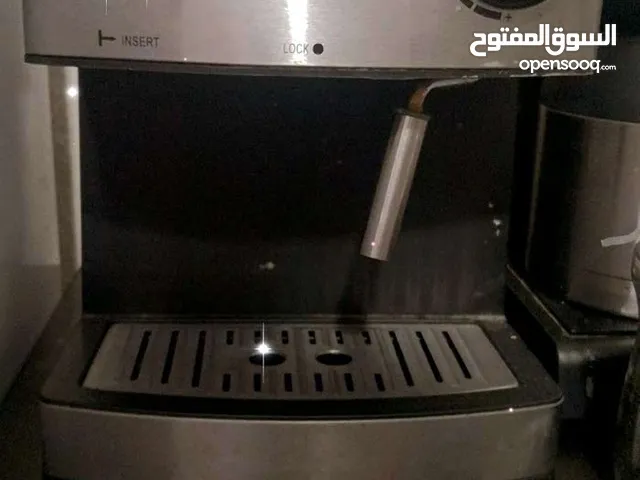 جهاز صنع الكبتشينو والقهوة