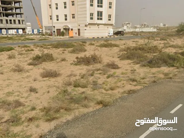 ارض سكني استثماري بنايات g+3علي شارع الإمارات العابر منطقة التلال الشارقة