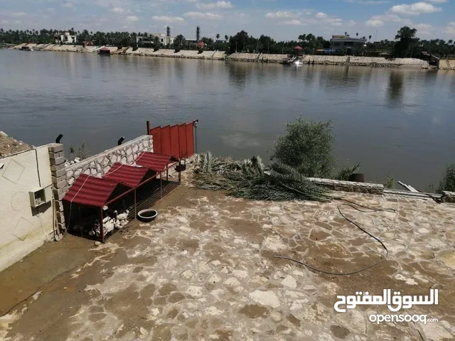شاليه مع على نهر في منطقة الدوره مساحة 2000 م