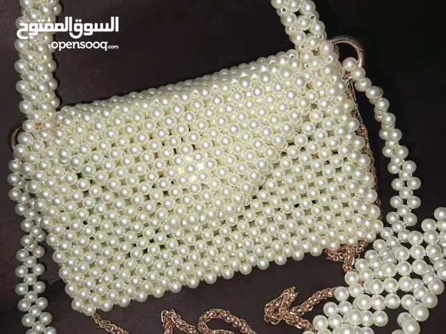 حقيبة يد من العقيق