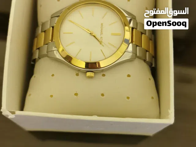 Gold Michael Kors for sale  in Irbid