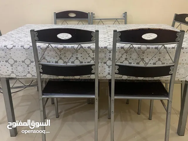 طاولة 5 كراسي وجلسة فردين