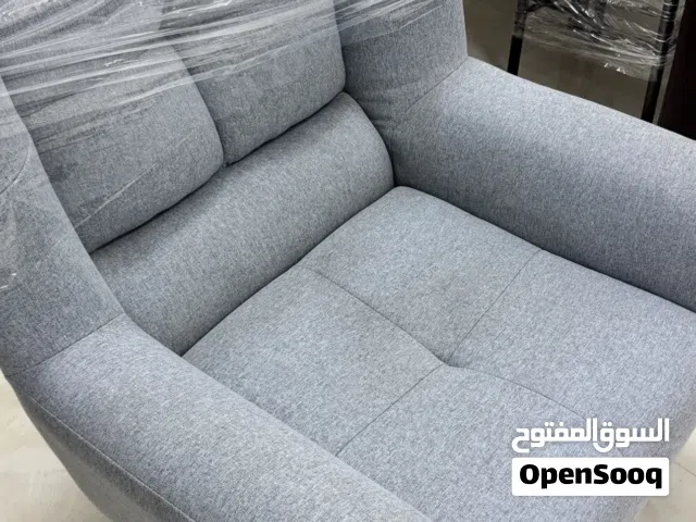 single-seater upholstered armchair