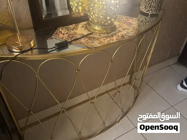 كونسول معدن ذهبي مع اضاءة