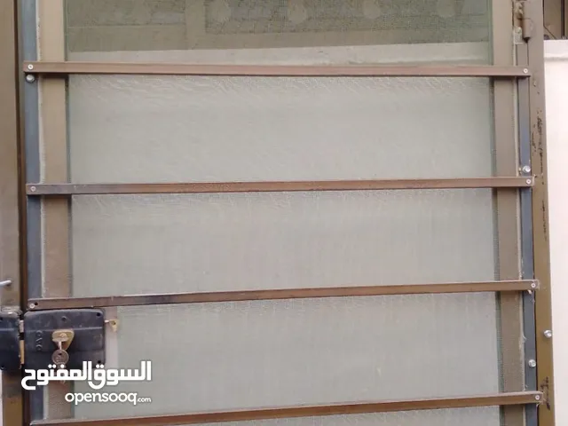 باب حديد منخل للبيع مع مفتاح