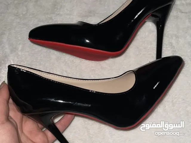 Black With Heels in Basra