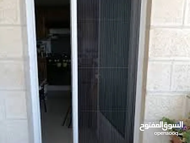 أبواب مناخل وأبواب اكورديم وكافة اشغال لاالمنيوم