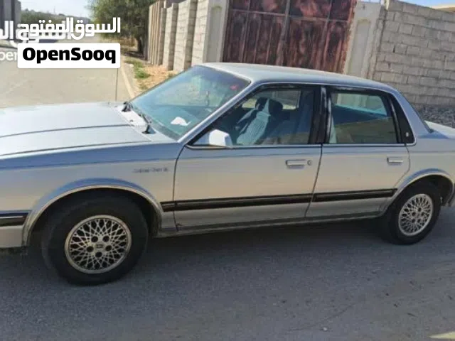 سياره امريكيه كلاسيكيه نوعها اولدزموبيل أقرا الوصف