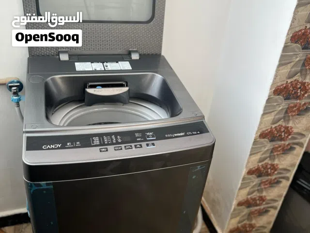 غسالة ملابس تحميل علوي ماركة Candy-موديل CLT 11x-4 سعة ممتازة 11 لتر حالة جيدة جدًا ونظيفة-استعمال ش