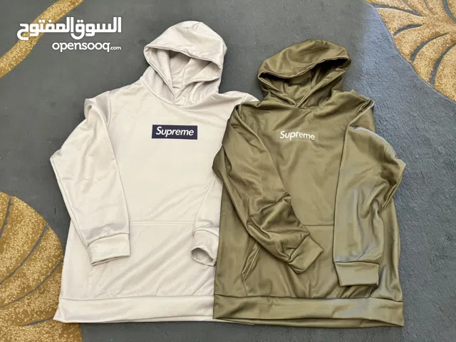 توب هودي من شركة supreme